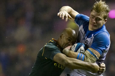 David Denton is tackled by JP Pietersen - pic © Al Ross