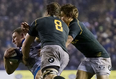 Duncan Weir smothered by South African defenders - pic © Al Ross