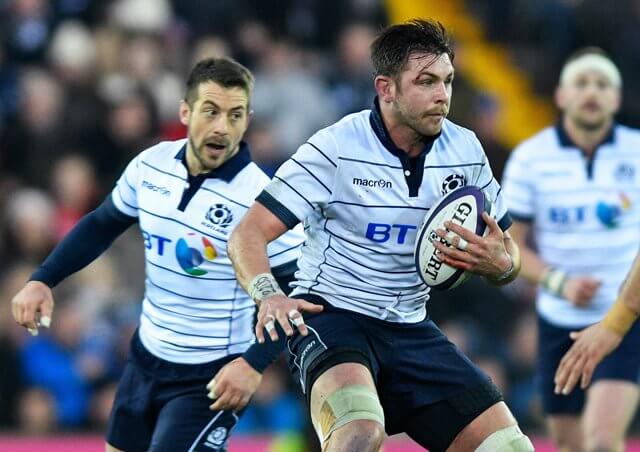 Greig Laidlaw watches as Ryan Wilson prepares for contact pic © Al Ross/Novantae Photography